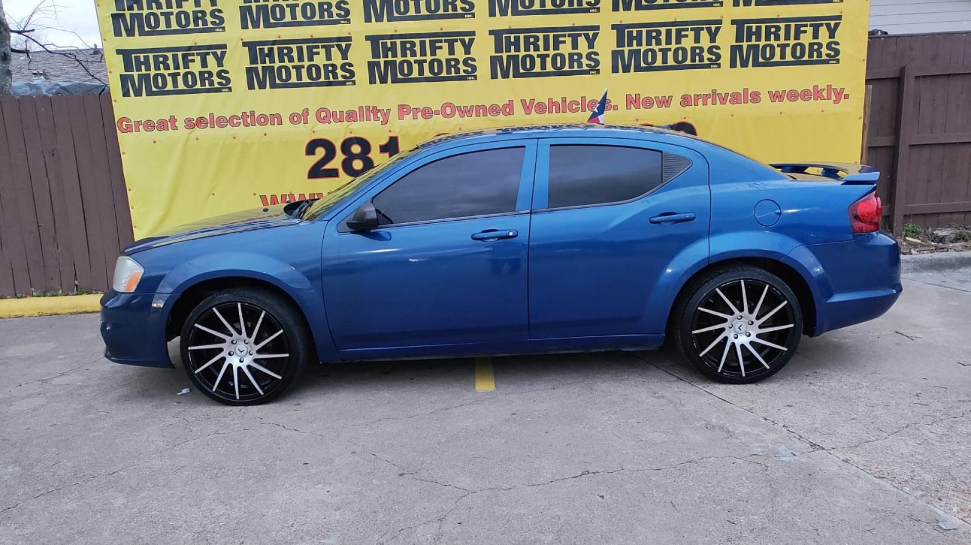 2014 Dodge Avenger SE (1C3CDZAB6EN) with an 2.4L L4 DOHC 16V engine, 4-Speed Automatic transmission, located at 16710 Clay Rd., Houston, TX, 77084, (281) 859-7900, 29.834864, -95.656166 - Photo#2